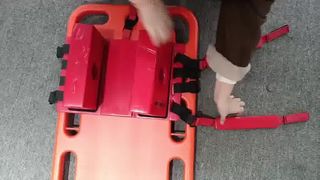 गर्दन को सहारा देने के लिए हेड इम्मोबिलाइज़र